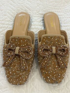 Toosili Footwear Embellished Bow Slide Mules in Beige Gold